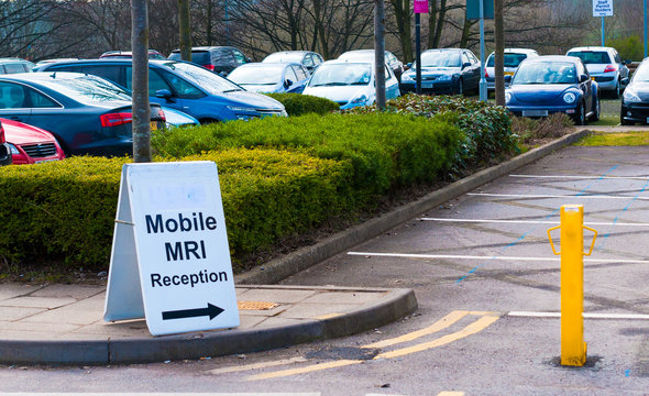 Mobile MRI scanning sign in a car park