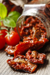 Dried tomatoes in glass jar