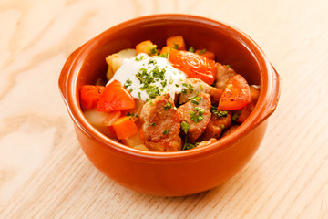 meat and vegetables in the pot