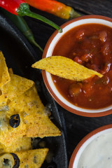mexican hot street food nachos with salsa dip