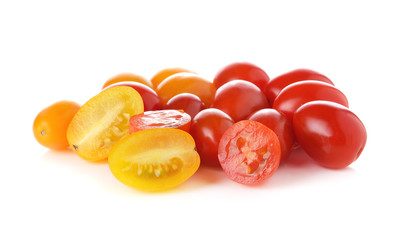red and yellow tomatoes on white background