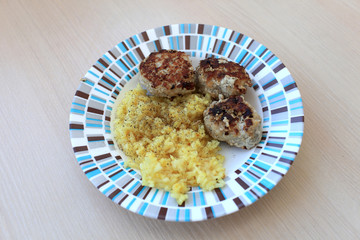 Plate with homemade meatballs and rice