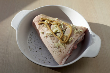 Pork knuckle marinated in mustard and garlic