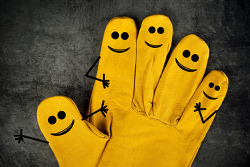 Happy Laughing Smileys on Fingers of Protective Gloves