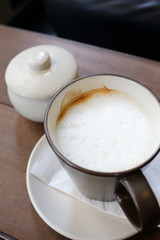hot coffee latte on wood table