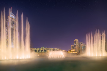 Fototapeta premium The dancing fountain Burj Khalifa in Dubai, UAE