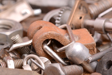 Fototapeta premium the old bolts, screws and metal details close up