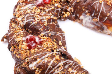 Chocolate pretzel with almond and raisins