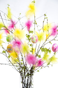 Easter Twigs with Coloured Feathers and Eggs