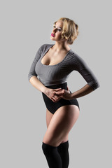 Naklejka premium Modern dancer in vintage swimsuit