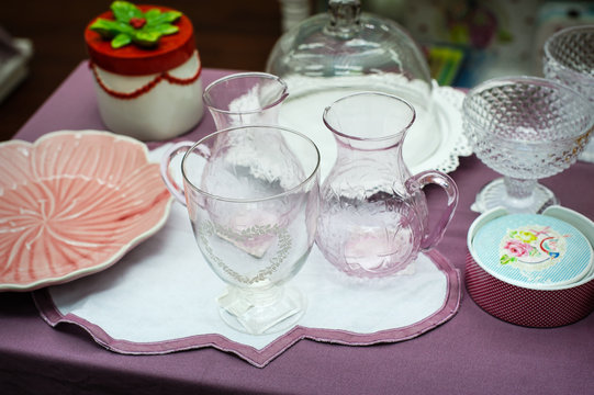 glass and porcelain tableware is on the table