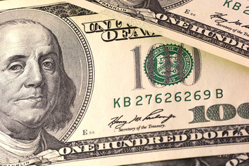 Dollars closeup. Benjamin Franklin portrait on one hundred