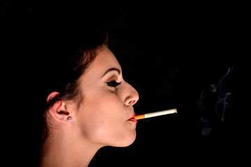 Fototapeta premium Smoking woman with a cigarette