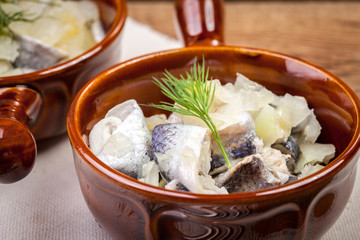 Tasty herring in pieces.
