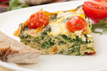 One Piece of Kale Tomato Frittata