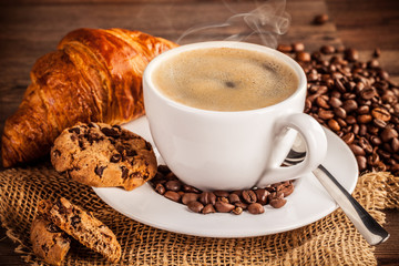 Cup of coffee with biscuits