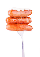 Three Fried Sausages with Mayonnaise