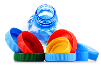 Composition with plastic bottles and caps