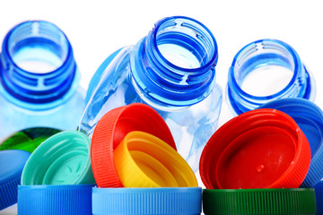 Composition with plastic bottles and caps