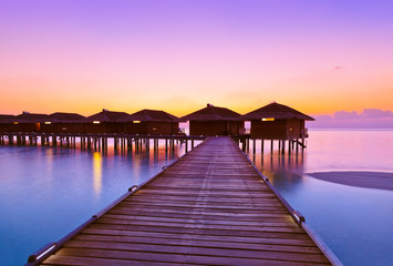 Fototapeta na wymiar Water bungalows on Maldives island