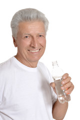 Old man drinks water