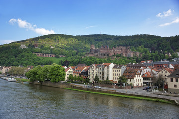 Fototapeta na wymiar Quay and barge in the river in summer Heidelberg