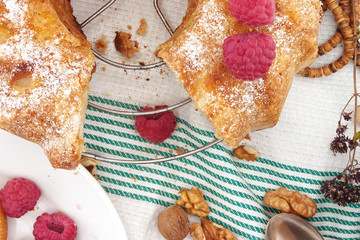 Sponge cake with apple, raspberry and cinnamon. Top view.
