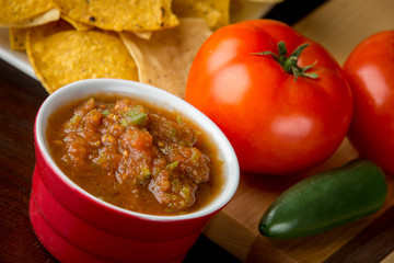Fresh salsa in red ramekin