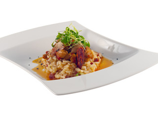 fried rabbit with spicy red sauce, risotto & chorizo