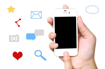 Smart phone in hand on social media icons background