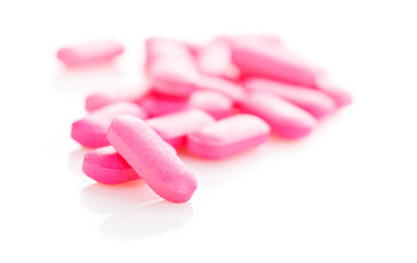 Obraz na płótnie Canvas Group of pink medical pills isolated