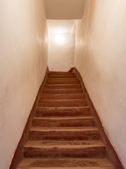 Fototapeta na wymiar The old wooden stair of Kasbah de Taourirt