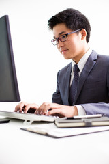 Handsome businessman working with laptop