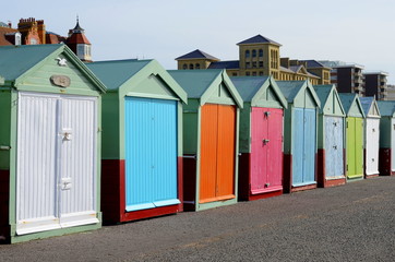 Fototapeta na wymiar Bathing boxes on the quay of Brighton Beach, England, UK.