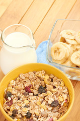 Delicious and healthy cereal in bowl with milk