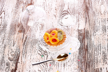 Fototapeta na wymiar sweet cake with fruits on plate