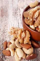 Mix nuts  on wooden  background