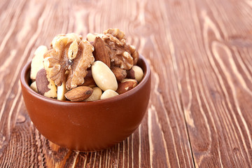 Mix nuts  on wooden  background