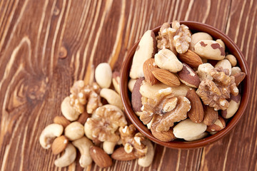 Mix nuts  on wooden  background