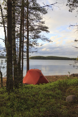 Tent on the shore of the lake.