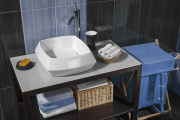 detail of a modern bathroom with sink and accessories_03