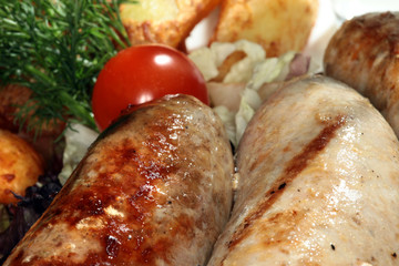 kupaty with potatoes