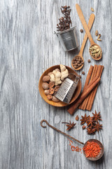 Various spices on wood