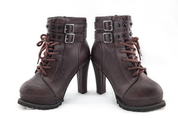 lady leather boot bown with shoelace on white background