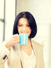 lovely businesswoman with mug
