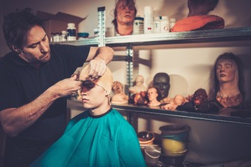 Men during lifecasting process in a prosthetic  workshop © Nejron Photo