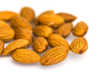 Group of Almond nuts isolated on white background