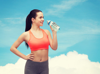 sporty woman with water bottle