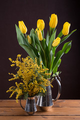 Two spring yellow bouquet of flowers