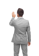 businessman touching something imaginary